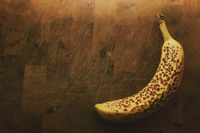 High angle view of banana on cutting board
