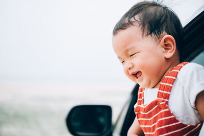 Portrait of cute boy looking at camera