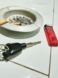 High angle view of cigarette on table