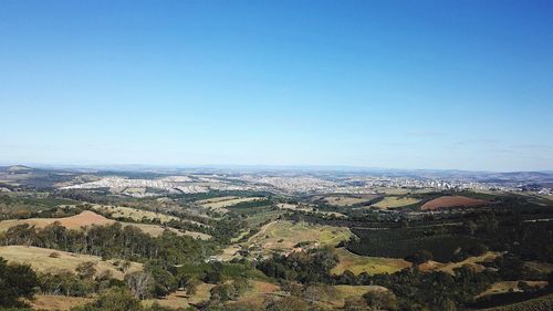 High angle view of landscape against clear blue sky