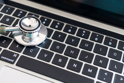 High angle view of computer keyboard on table