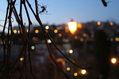 View of illuminated city at sunset