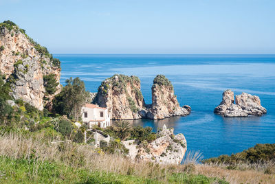 Scenic view of sea against clear sky