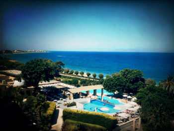 Scenic view of sea against blue sky