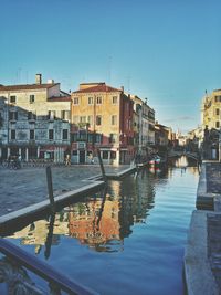 View of canal along buildings