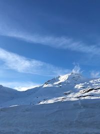 Snowcapped mountains against sky