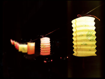 Close-up of illuminated lantern hanging at night