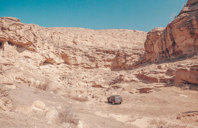 Scenic view of desert against clear sky