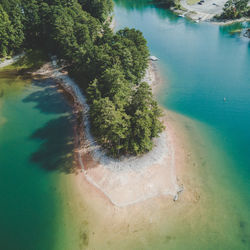 High angle view of swimming pool by sea against sky