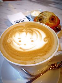 Close-up of cappuccino on table