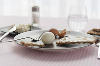 Close-up of breakfast served on table