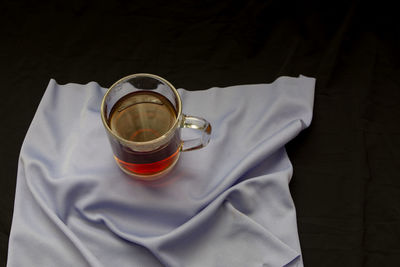 High angle view of coffee cup on table