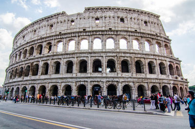 Group of people in front of historical building