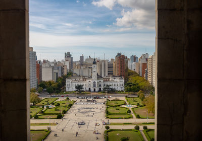 Buildings in city against sky