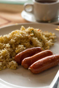 Close-up of breakfast in plate on table