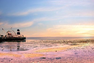 Scenic view of sea at sunset