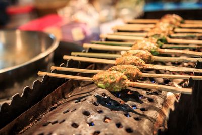 Close-up of food on barbecue grill