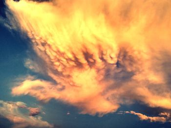 Low angle view of clouds in sky during sunset
