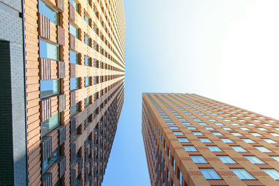 Low angle view of modern building against sky