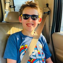 Portrait of smiling boy wearing sunglasses