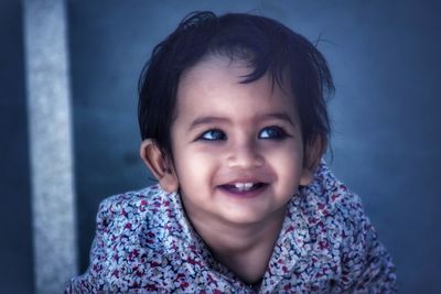 Portrait of cute baby boy smiling