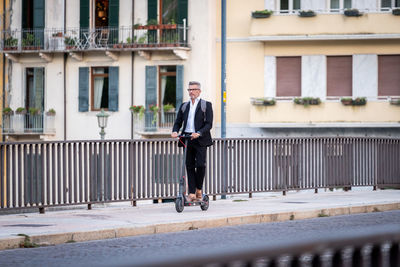 Full length of man walking in office building