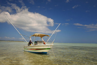 Boat in sea against sky