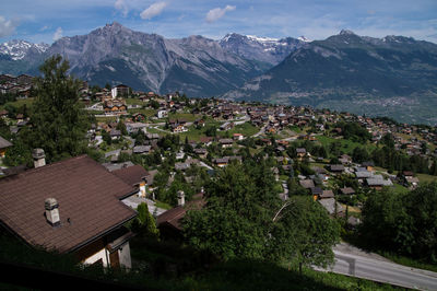 High angle view of houses against mountains