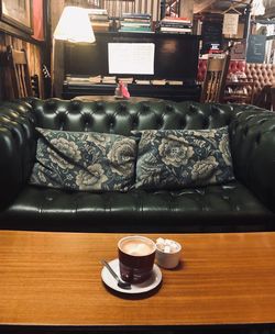 Coffee cup on table in cafe