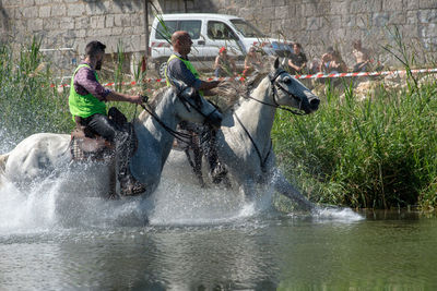 People enjoying in water