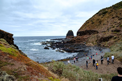 Scenic view of sea against cloudy sky