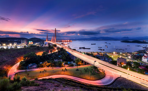 High angle view of light trails on road against sky