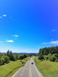 Country road along trees