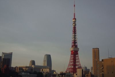 View of communications tower in city