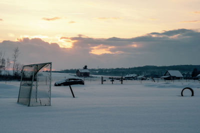 Scenic view of beach against sky during sunset