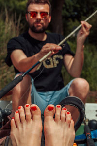 Close-up of man playing guitar