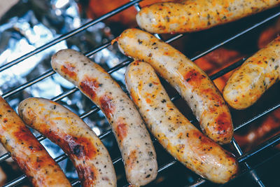 Close-up of meat on barbecue grill