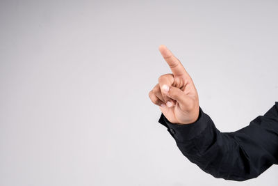 Midsection of man against white background