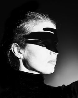 Portrait of a young woman looking away