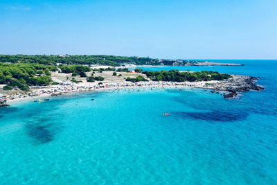 Scenic view of sea against clear blue sky