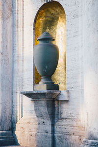 Low angle view of electric lamp on wall