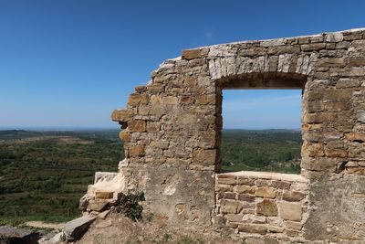 Old ruins against blue sky