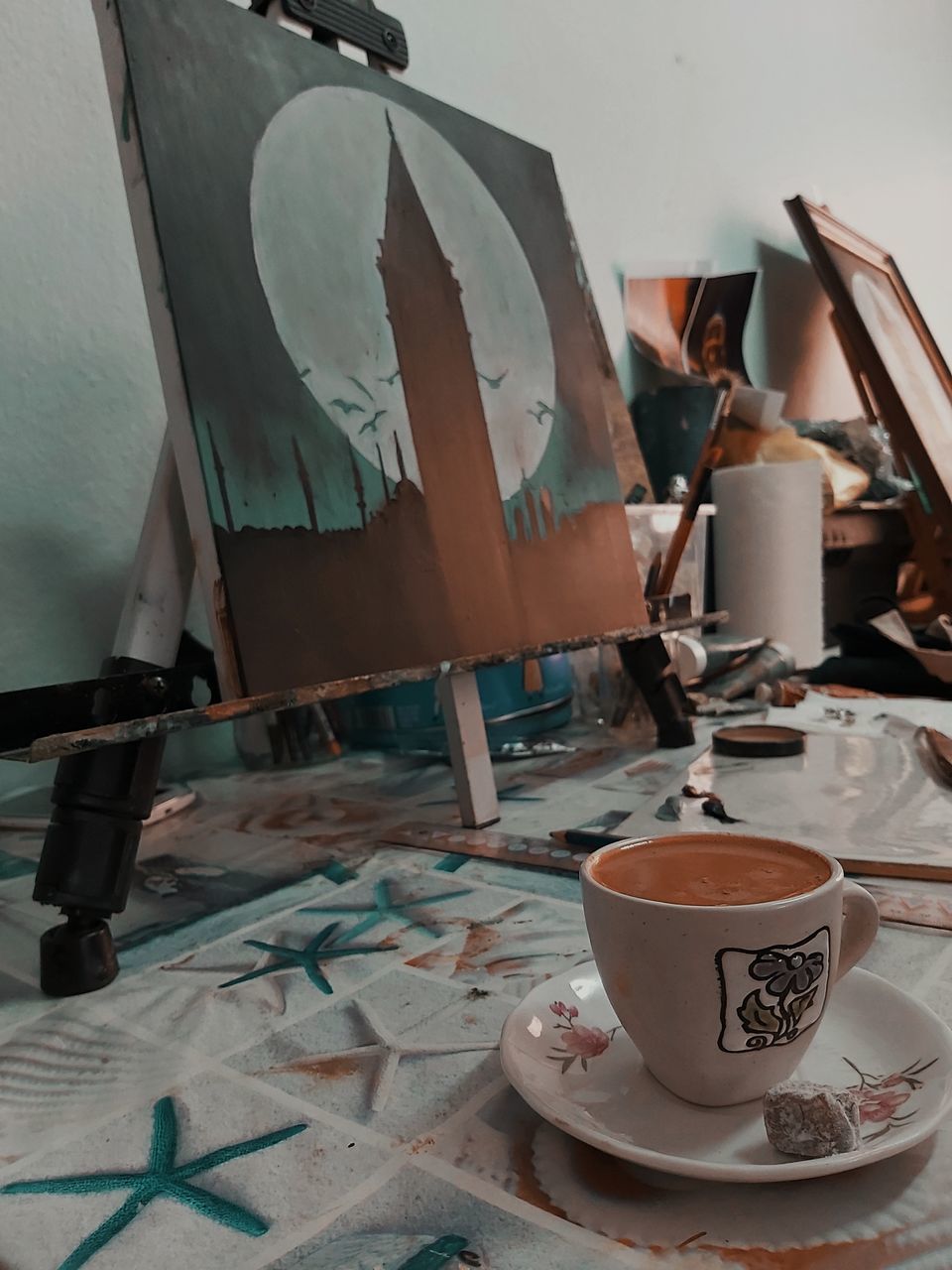 COFFEE CUP ON TABLE