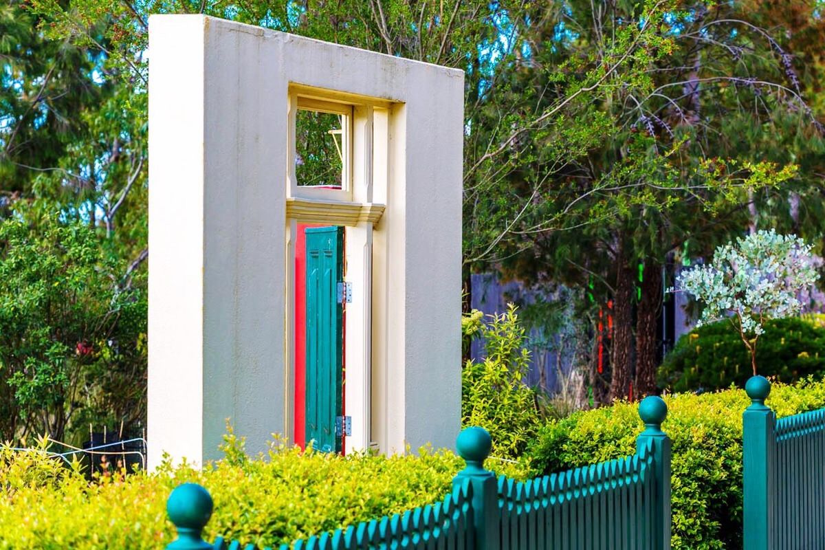 building exterior, built structure, architecture, house, tree, green color, multi colored, plant, window, railing, growth, balcony, residential structure, day, blue, wood - material, outdoors, green, no people, nature