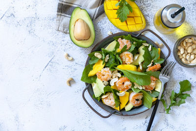 High angle view of fruits in bowl on table