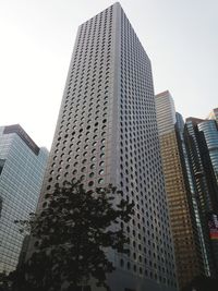 Low angle view of modern buildings against clear sky