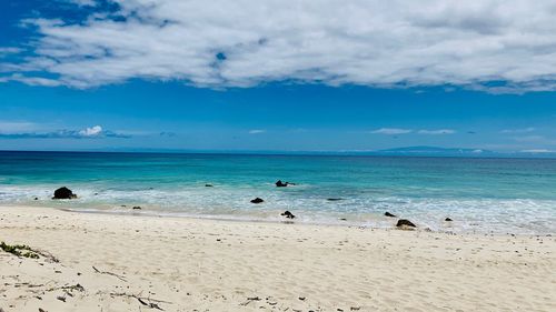 Scenic view of beach against sky