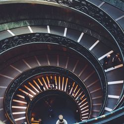 High angle view of people on staircase in  building