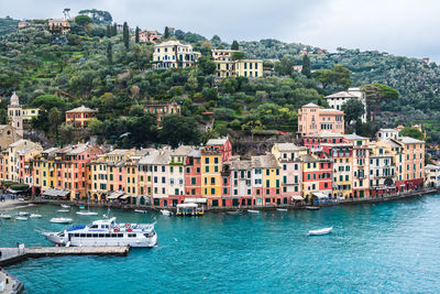 View of buildings by sea