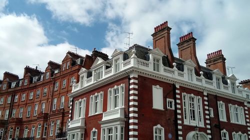 Low angle view of residential buildings against sky